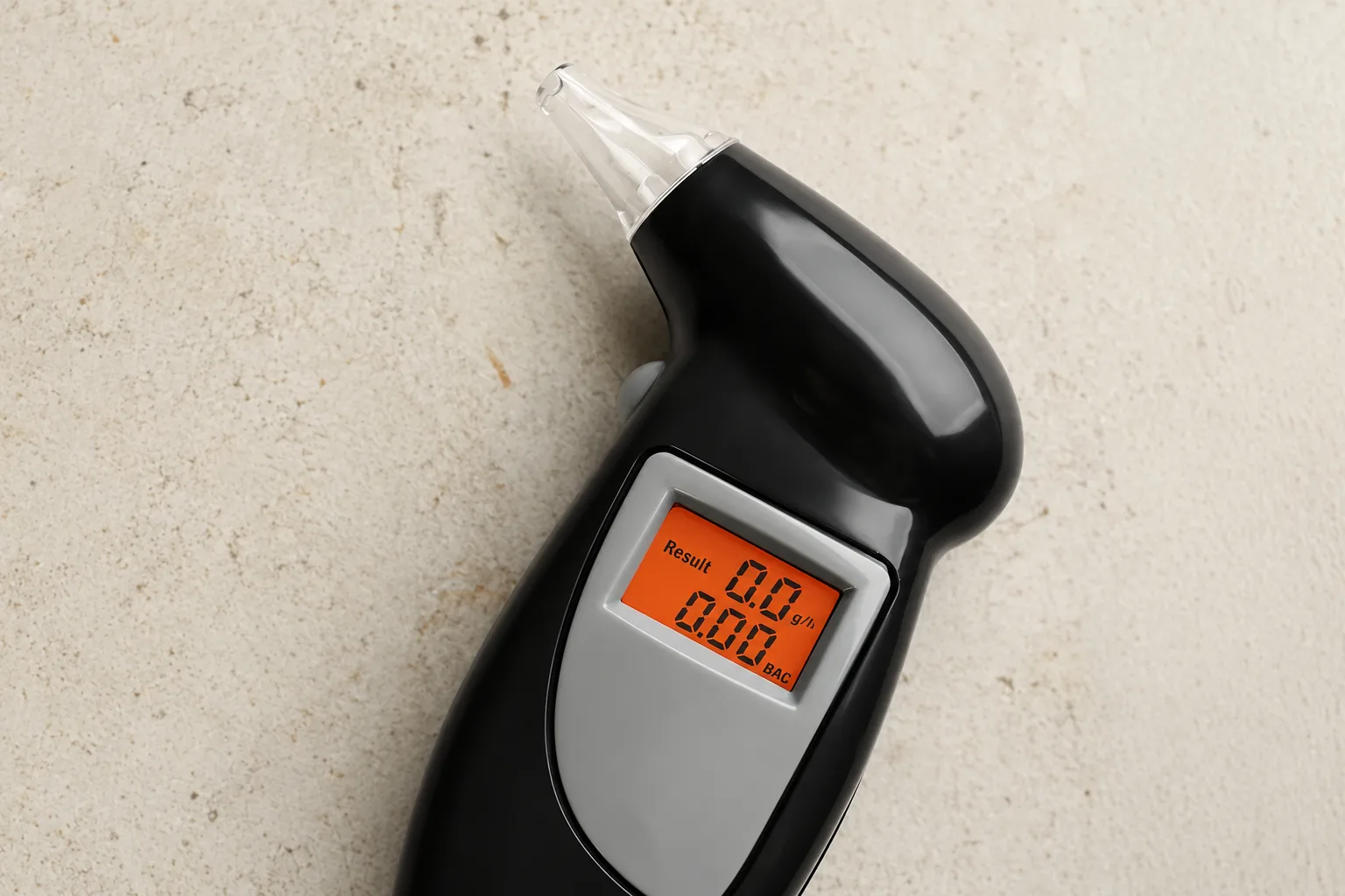 AlcoGate breathalyser on a stone worktop